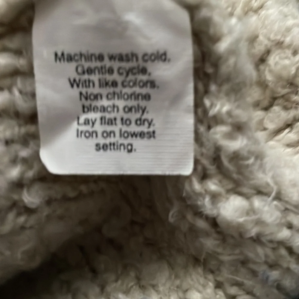 J. Crew V neck acrylic wool blend sweater. Machine wash. Nice, some wear